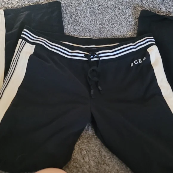 STUNNING BCBG black trackpants with side stripes - Picture 2 of 11